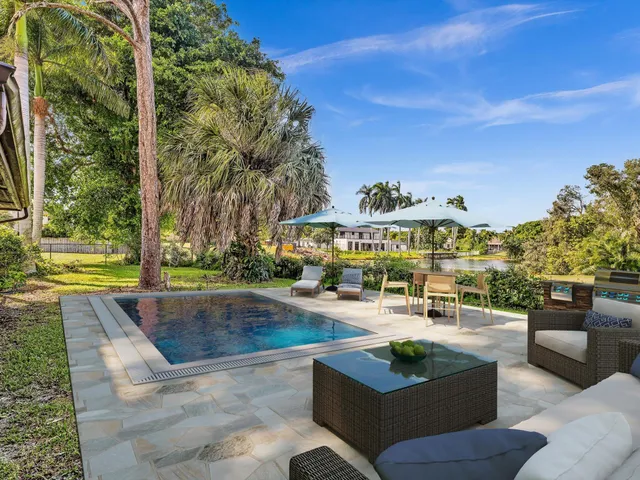 an aerial view of residential building and ocean