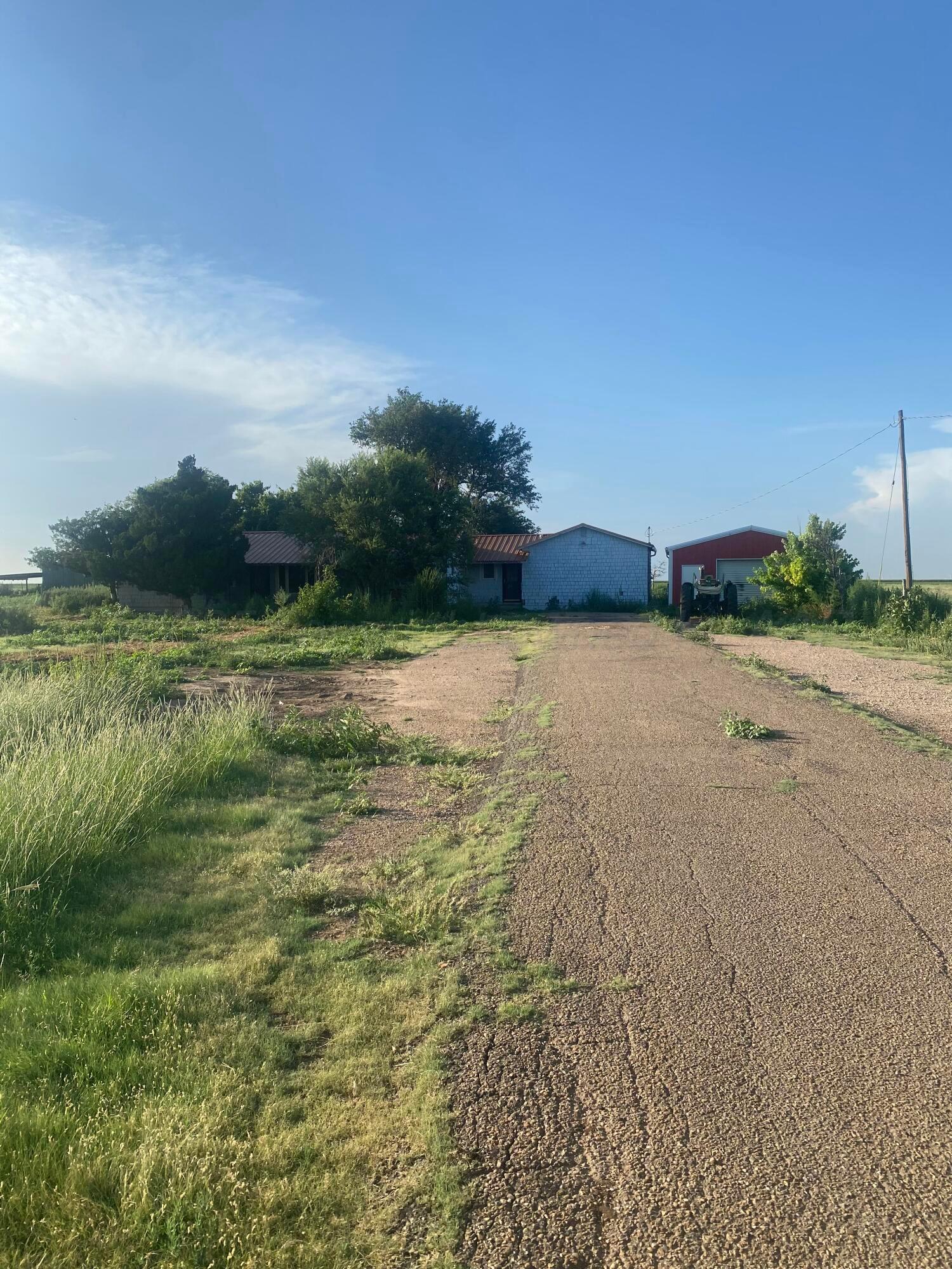 a view of a lake with houses in the back
