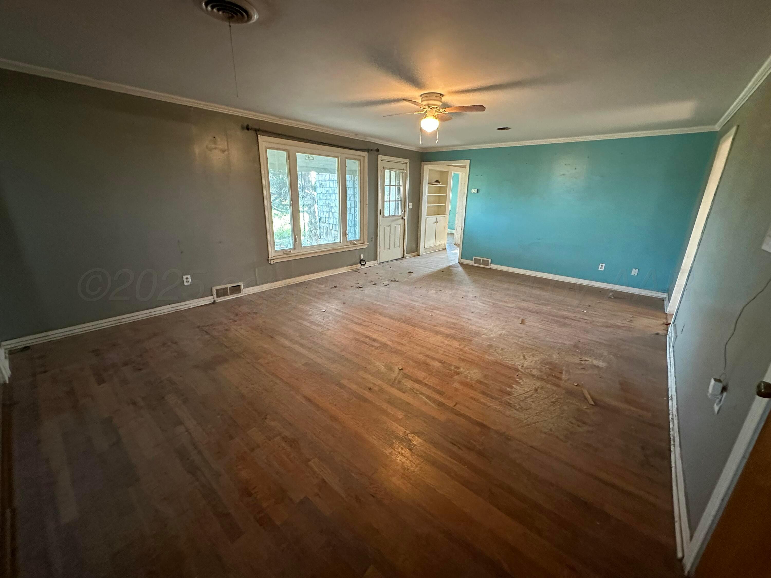 1381 Fm 293 Road Panhandle, TX 79068 - Photo 3 of 12 a view of an empty room with a window