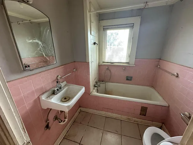 a bathroom with a sink and a bathtub