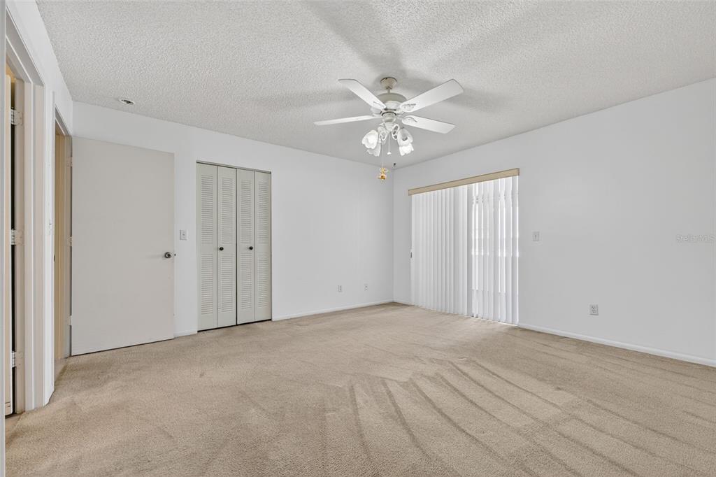 64 Winter Ridge Road, Unit 64 Winter Haven, FL 33881 - Photo 25 of 52 a view of an empty room with a window