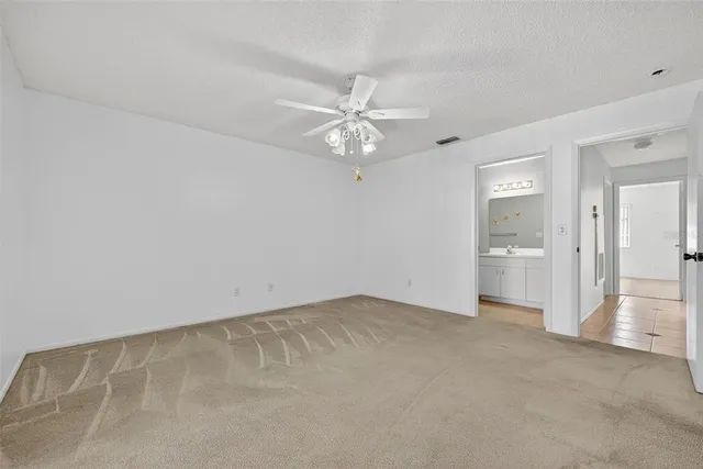 an empty room with a bathroom