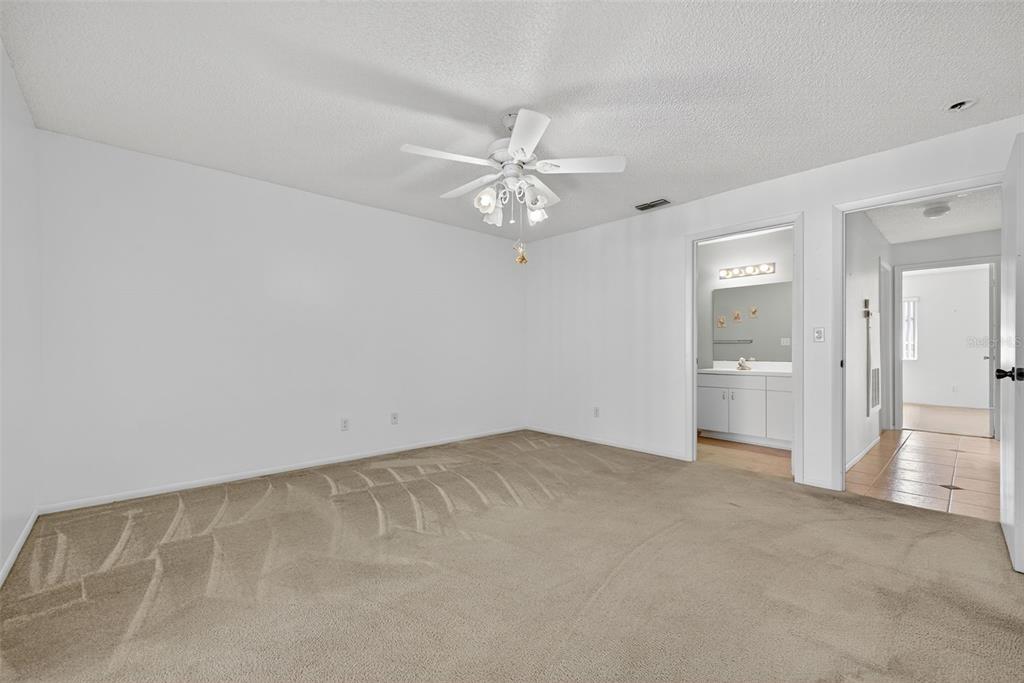 64 Winter Ridge Road, Unit 64 Winter Haven, FL 33881 - Photo 26 of 52 an empty room with a bathroom