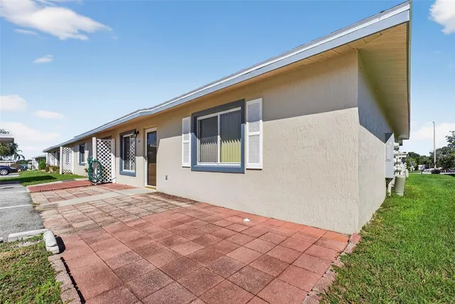 an aerial view of a house with a garden