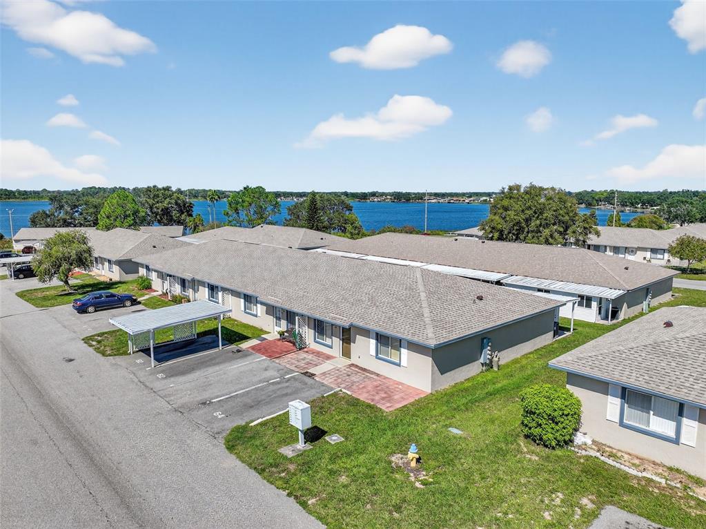 64 Winter Ridge Road, Unit 64 Winter Haven, FL 33881 - Photo 39 of 52 an aerial view of a house with a garden
