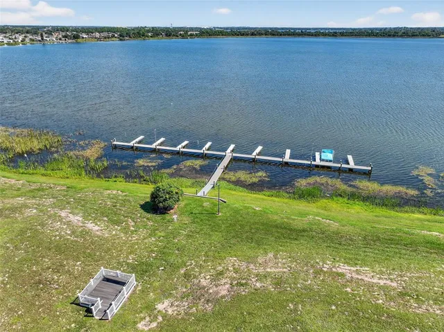 a view of a sign board with a small yard
