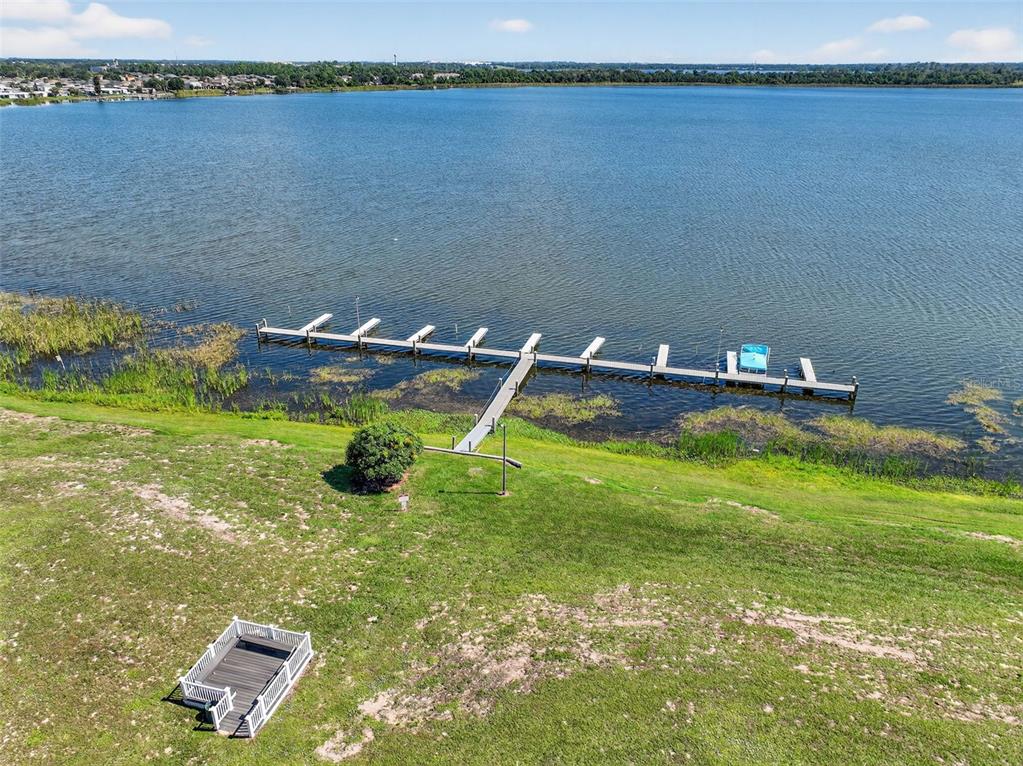 64 Winter Ridge Road, Unit 64 Winter Haven, FL 33881 - Photo 46 of 52 a view of a lake with houses