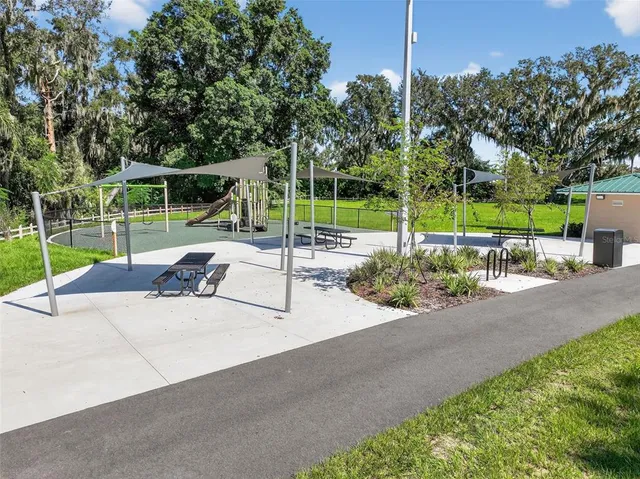 view of a lake with a house in the background