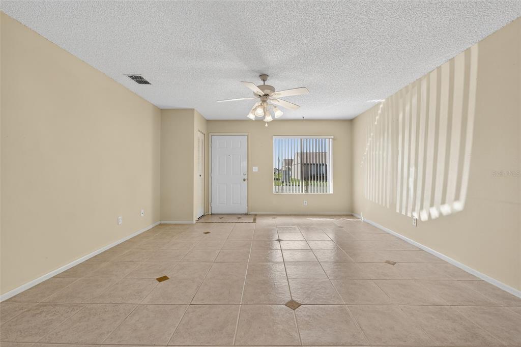 64 Winter Ridge Road, Unit 64 Winter Haven, FL 33881 - Photo 6 of 52 a view of an empty room with a window