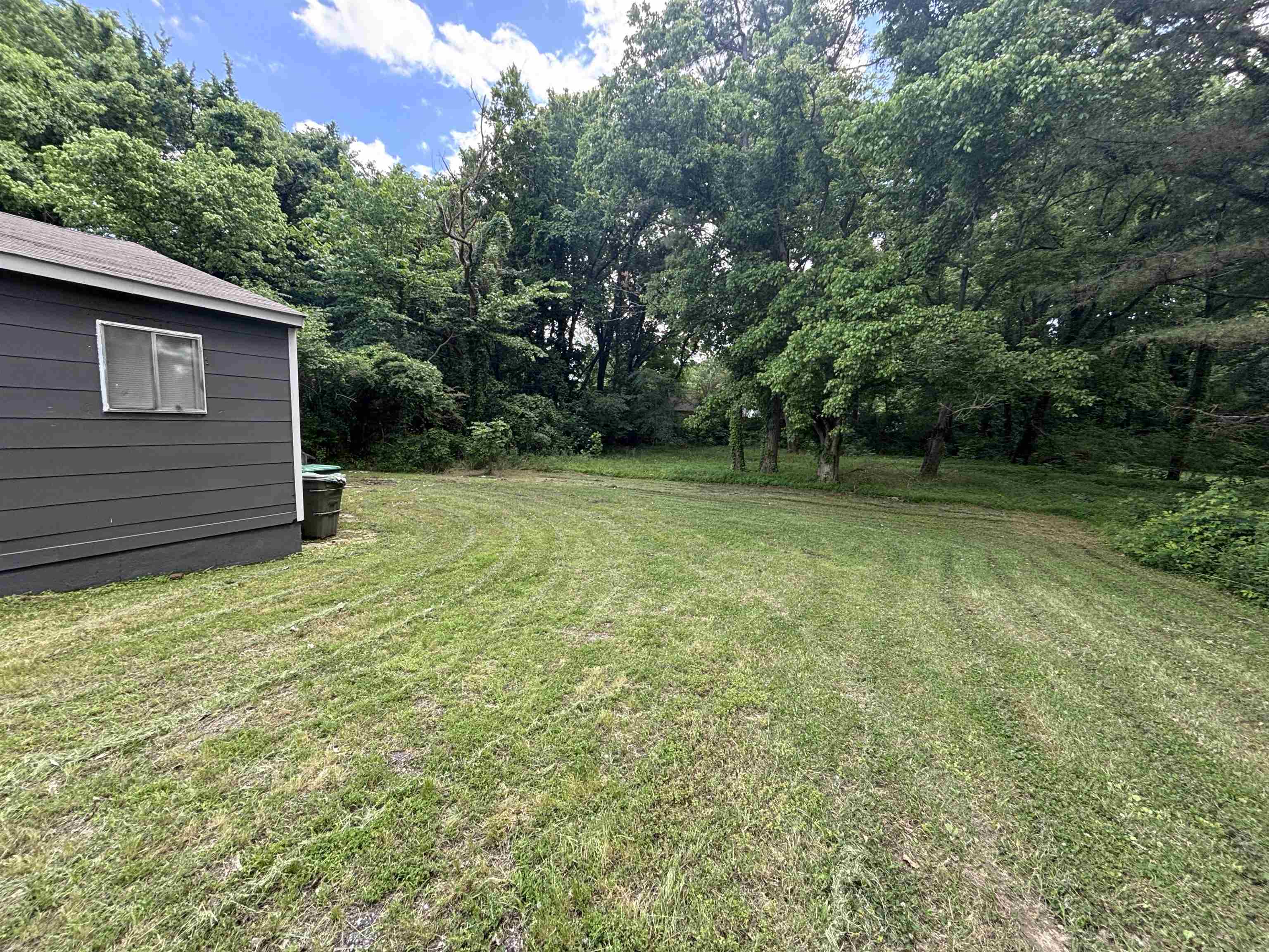 3589 Hawkins Mill Road Memphis, TN 38128 - Photo 3 of 9 a view of a backyard