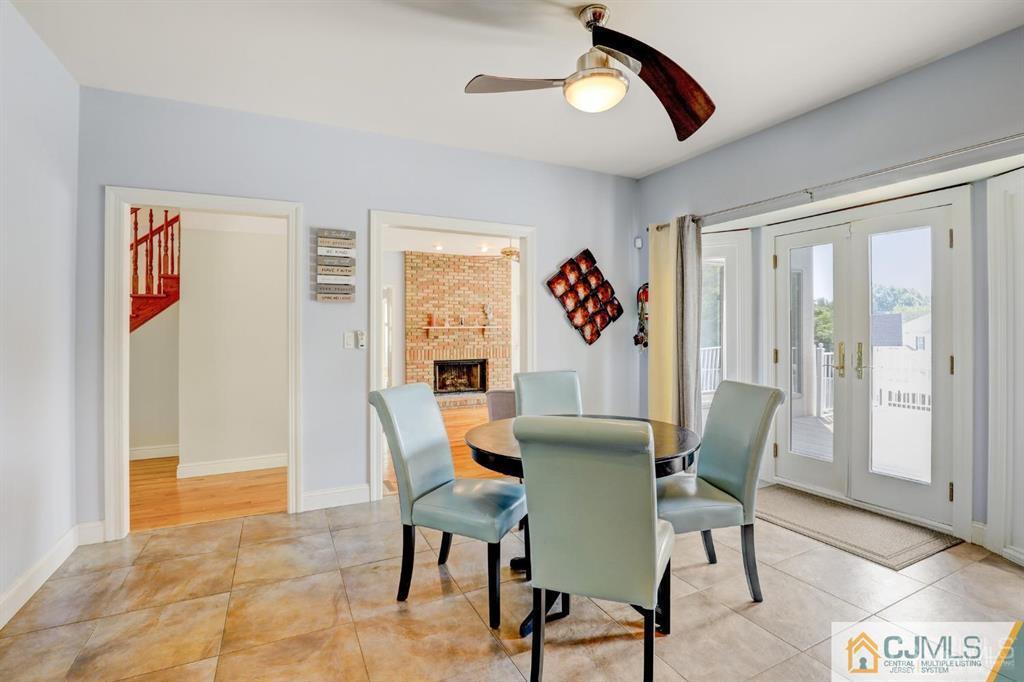 2 The Summit Holmdel, NJ 07733 - Photo 15 of 57 a view of a dining room with furniture and a window