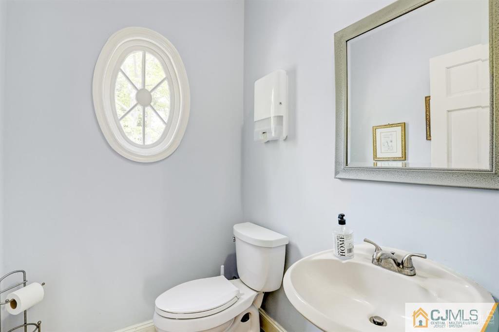 2 The Summit Holmdel, NJ 07733 - Photo 34 of 57 a bathroom with a sink and a toilet