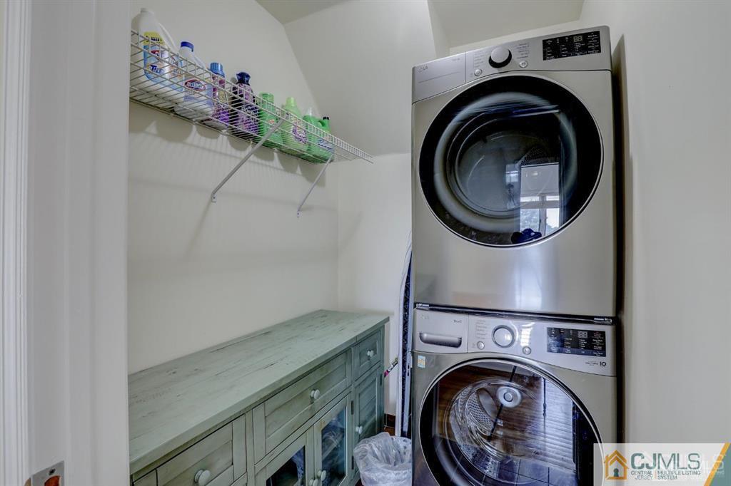 2 The Summit Holmdel, NJ 07733 - Photo 48 of 57 a utility room with dryer and washer