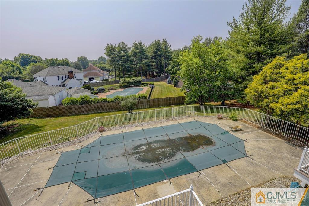 2 The Summit Holmdel, NJ 07733 - Photo 49 of 57 a view of a swimming pool with a yard