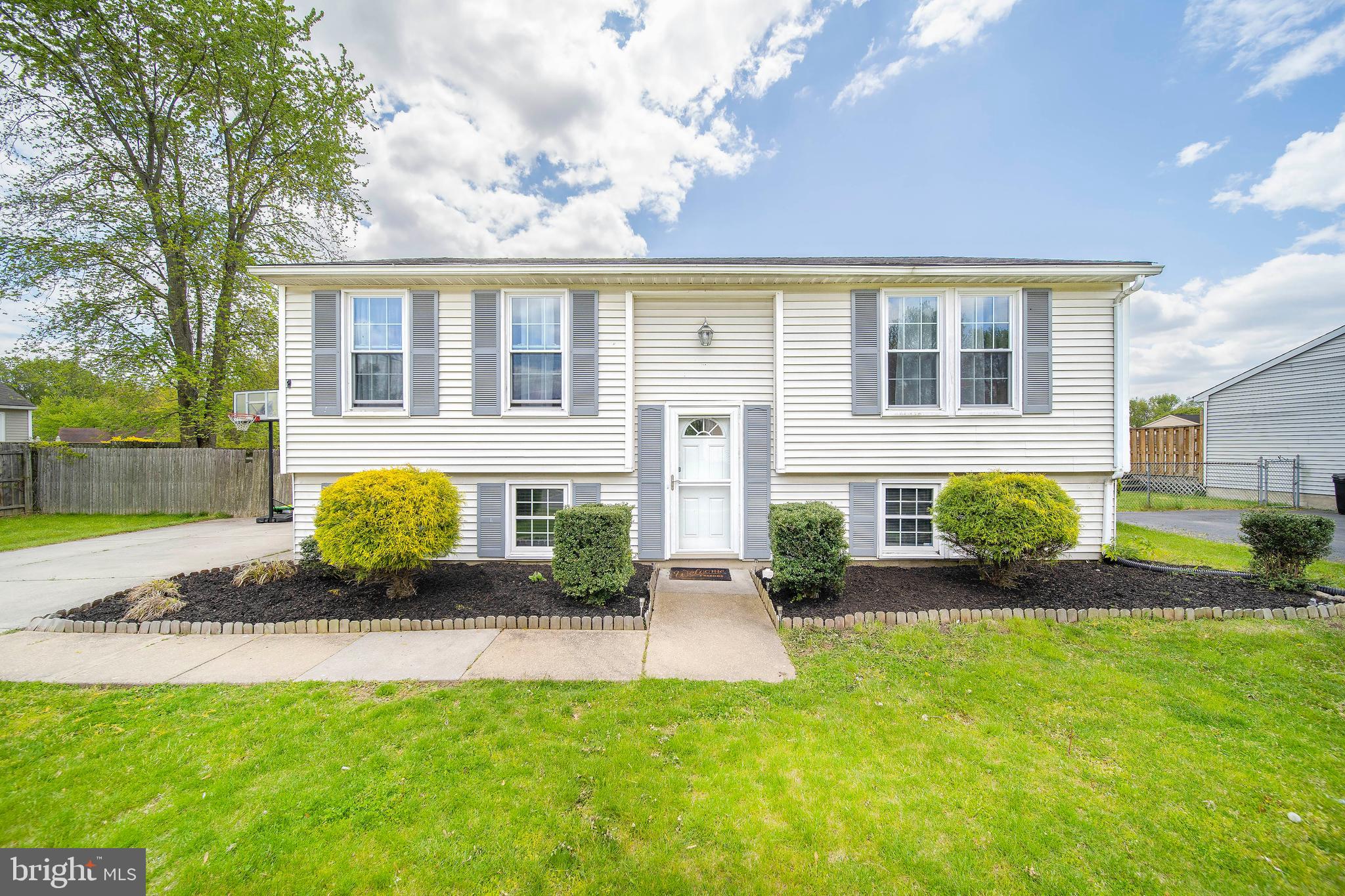 16 Leader Drive Newark, DE 19713 - Photo 1 of 28 a front view of a house with a yard and outdoor seating