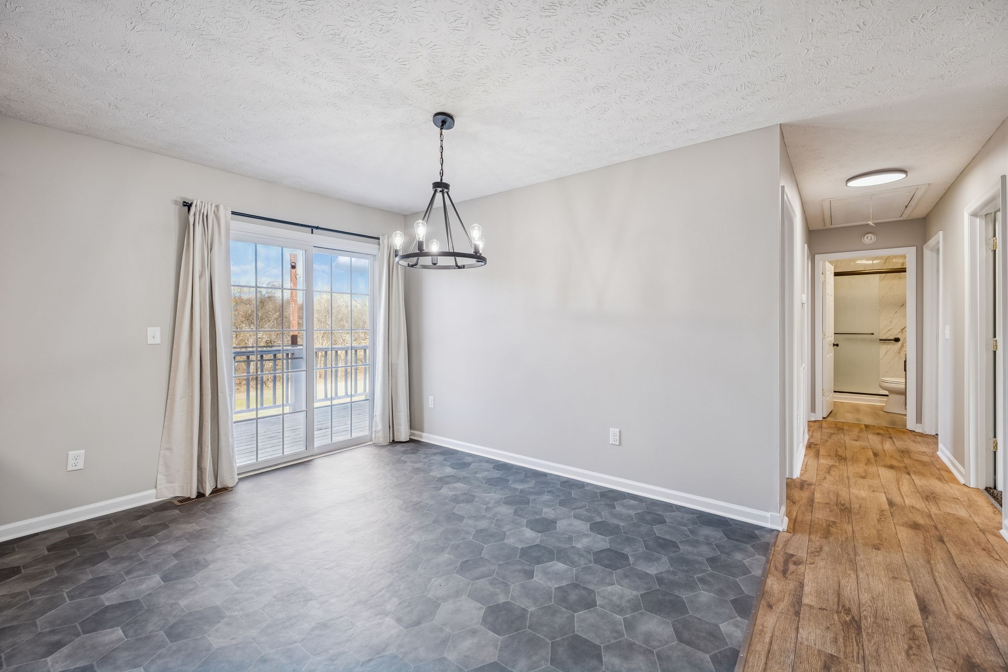 162 Pigeon Roost Road Brush Creek, TN 38547 - Photo 13 of 50 a view of empty room with wooden floor