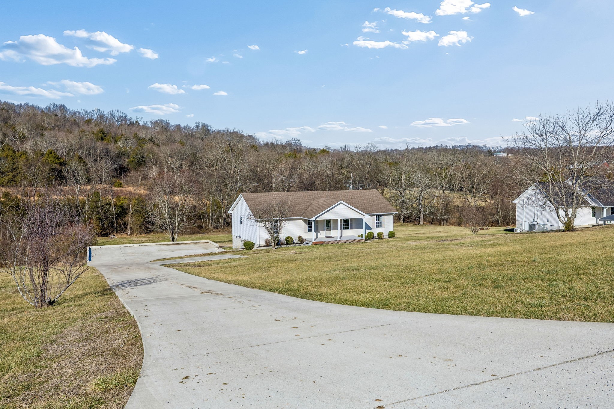 162 Pigeon Roost Road Brush Creek, TN 38547 - Photo 2 of 50 a view of a town with big yard