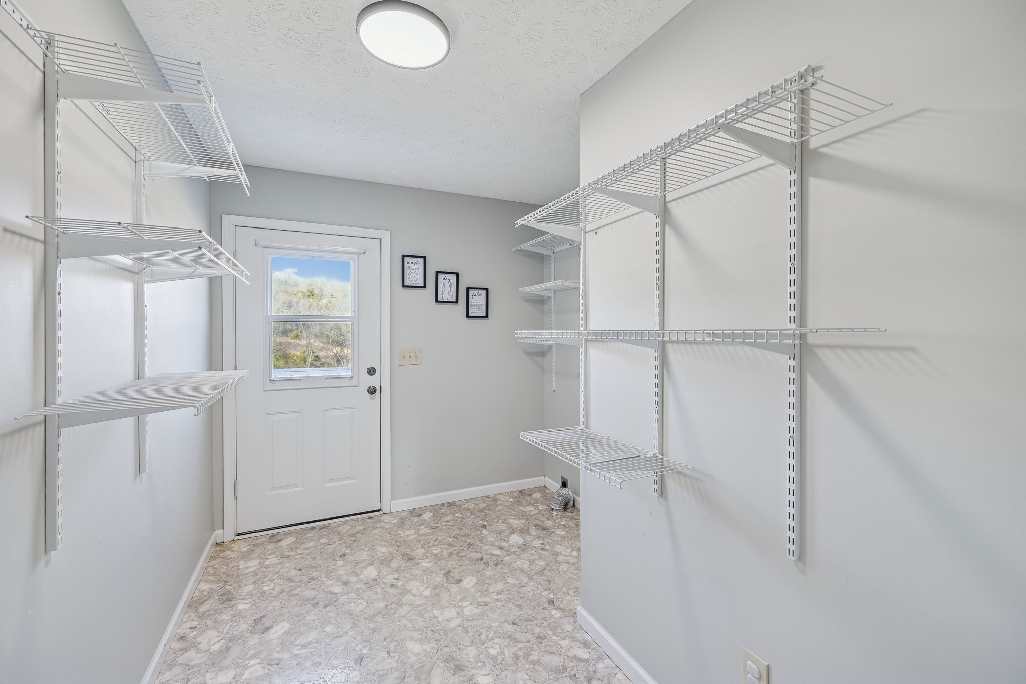 162 Pigeon Roost Road Brush Creek, TN 38547 - Photo 29 of 50 a view of a room with rack on the wall