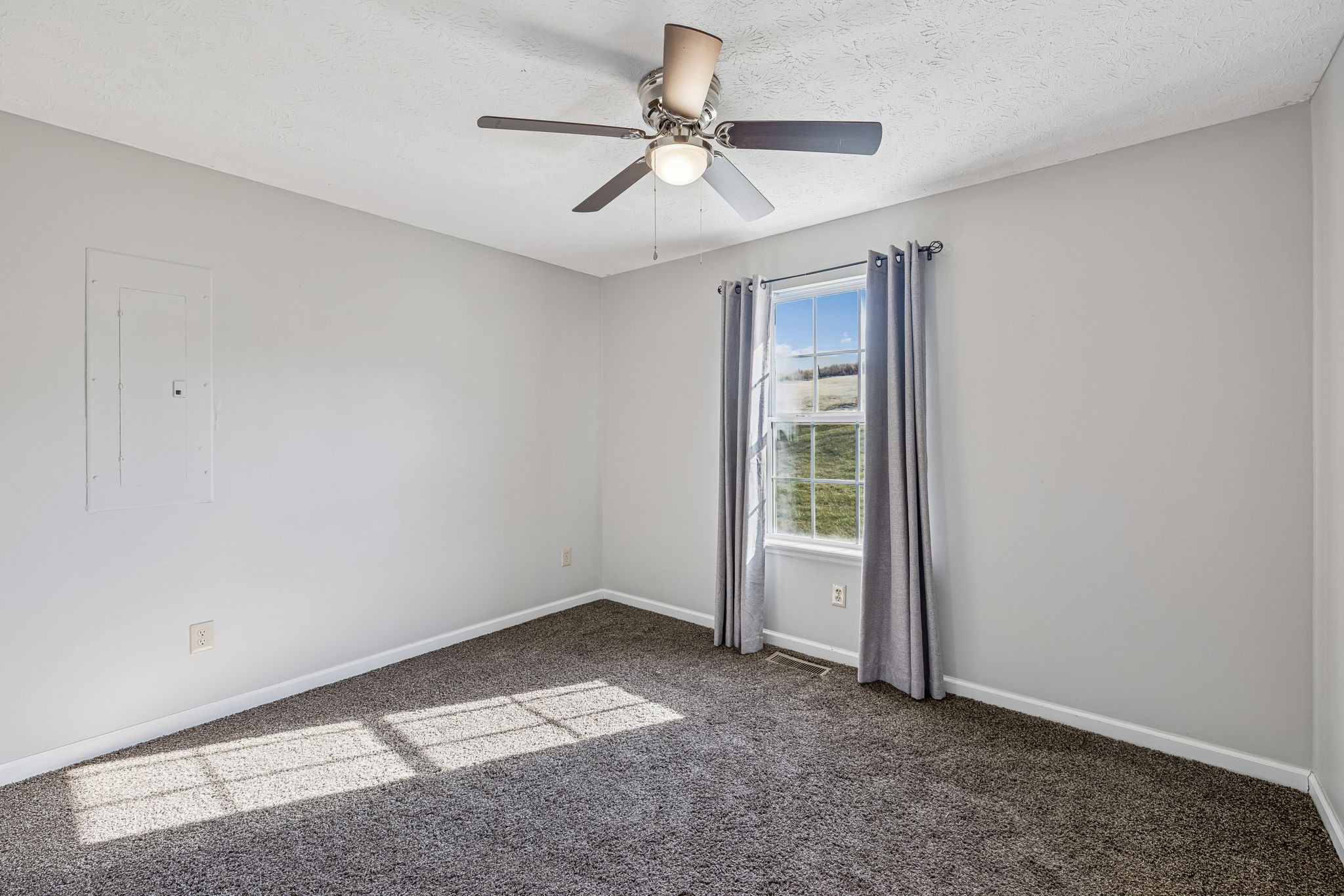162 Pigeon Roost Road Brush Creek, TN 38547 - Photo 35 of 50 a view of an empty room with a window