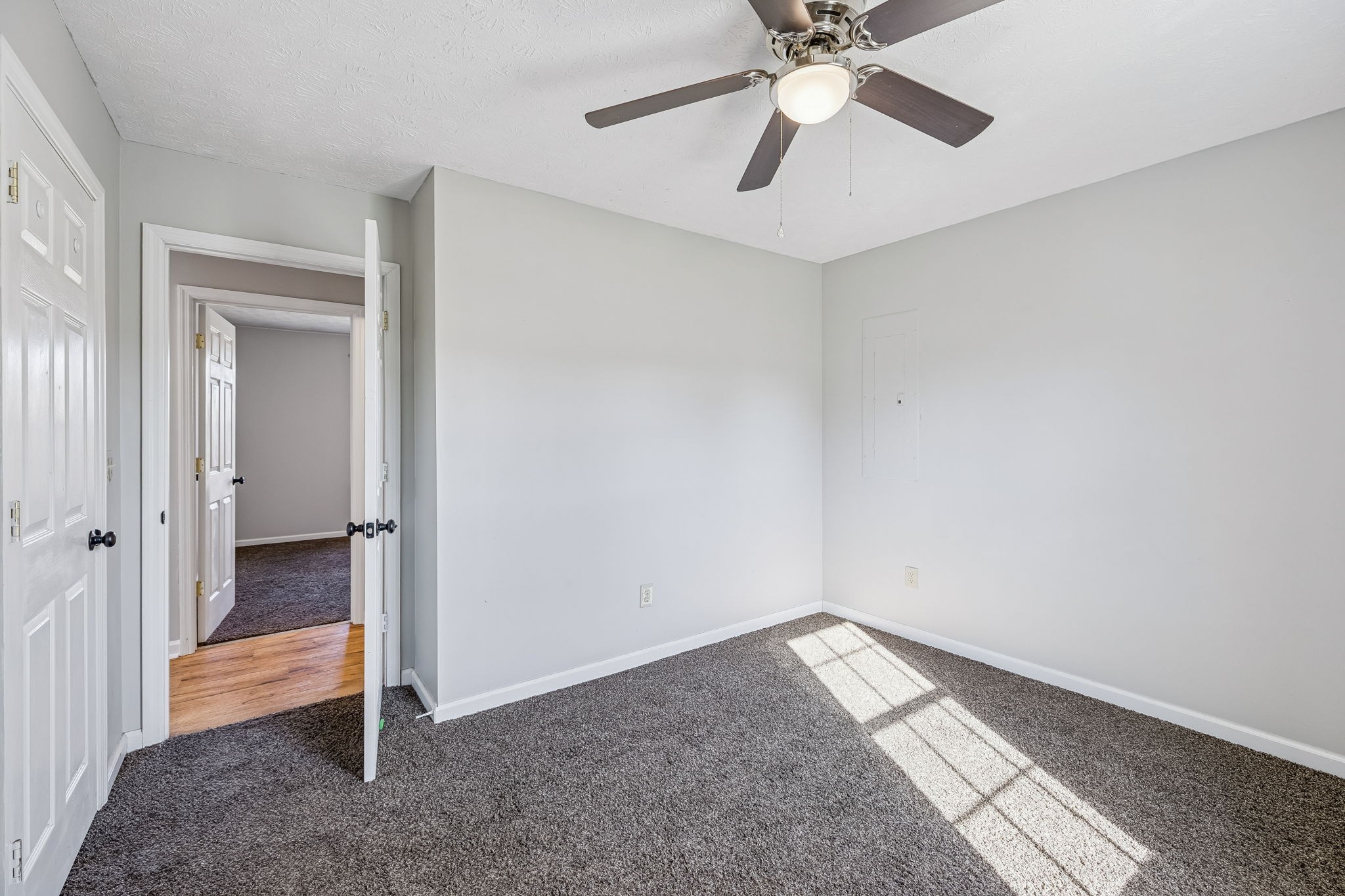 162 Pigeon Roost Road Brush Creek, TN 38547 - Photo 36 of 50 an empty room with a ceiling fan and carpet