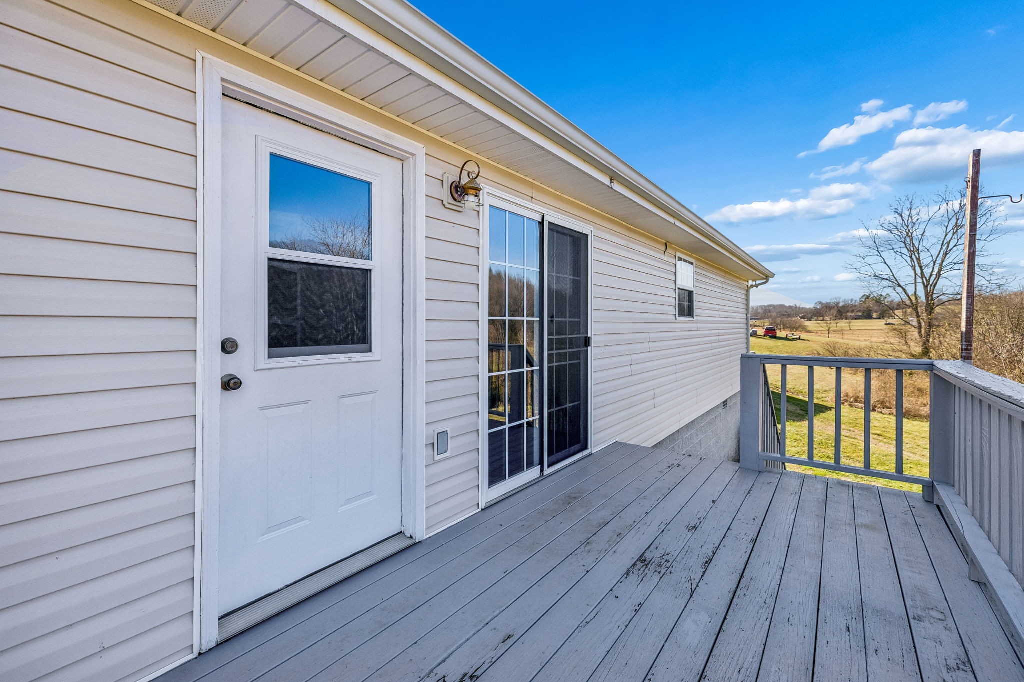 162 Pigeon Roost Road Brush Creek, TN 38547 - Photo 41 of 50 a view of front door deck and wooden floor