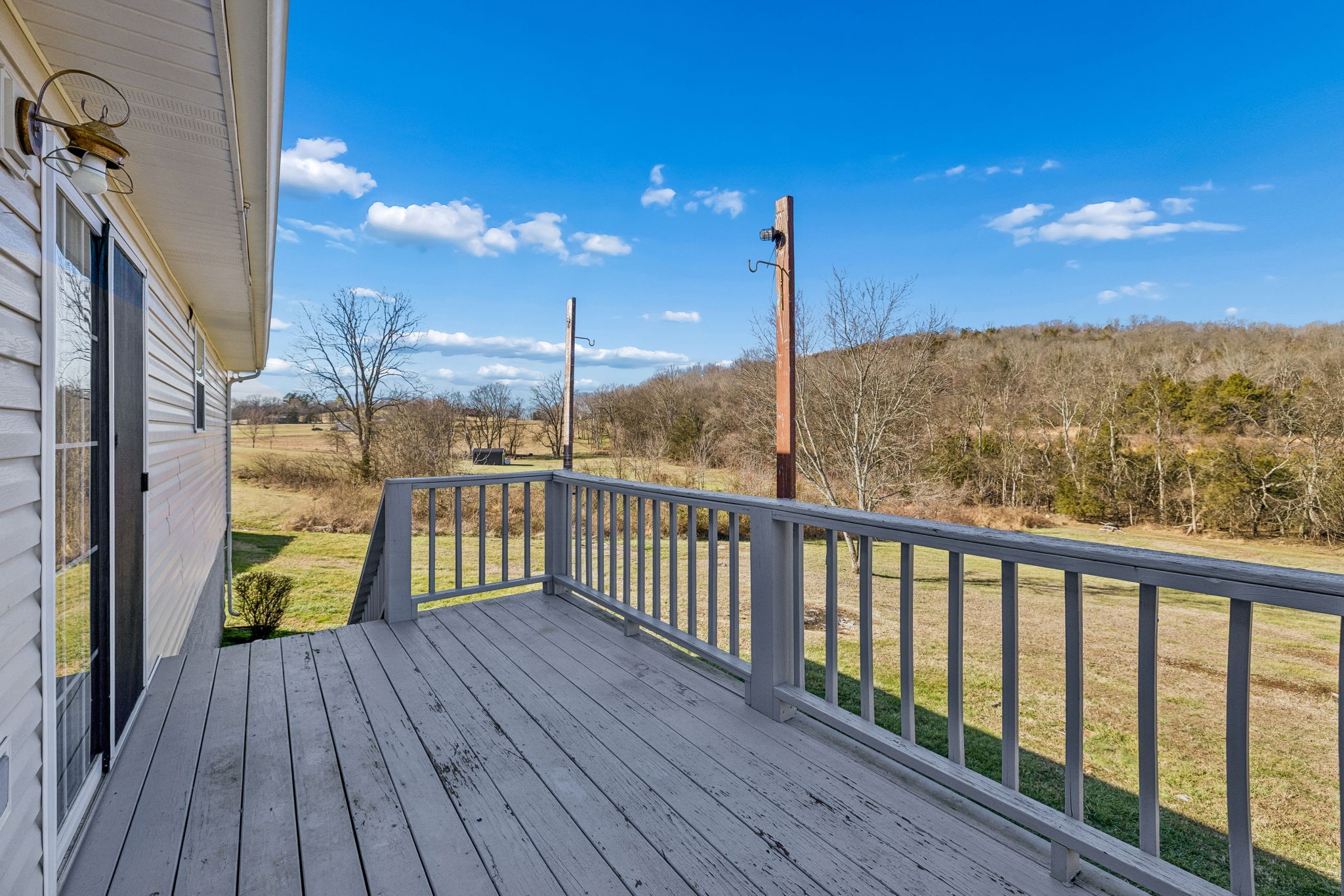 162 Pigeon Roost Road Brush Creek, TN 38547 - Photo 42 of 50 a view of a balcony with wooden floor