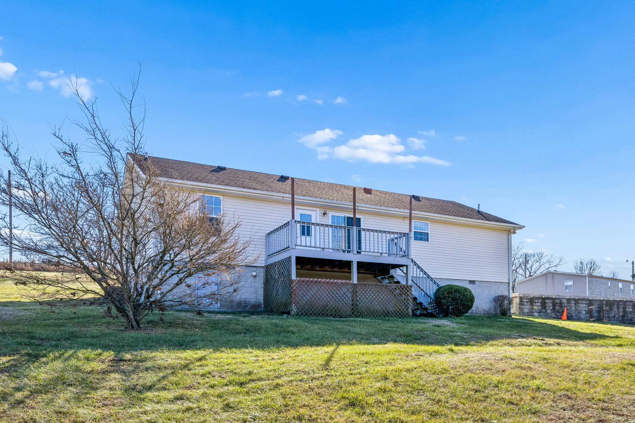 162 Pigeon Roost Road Brush Creek, TN 38547 - Photo 45 of 50 a view of a house with a yard