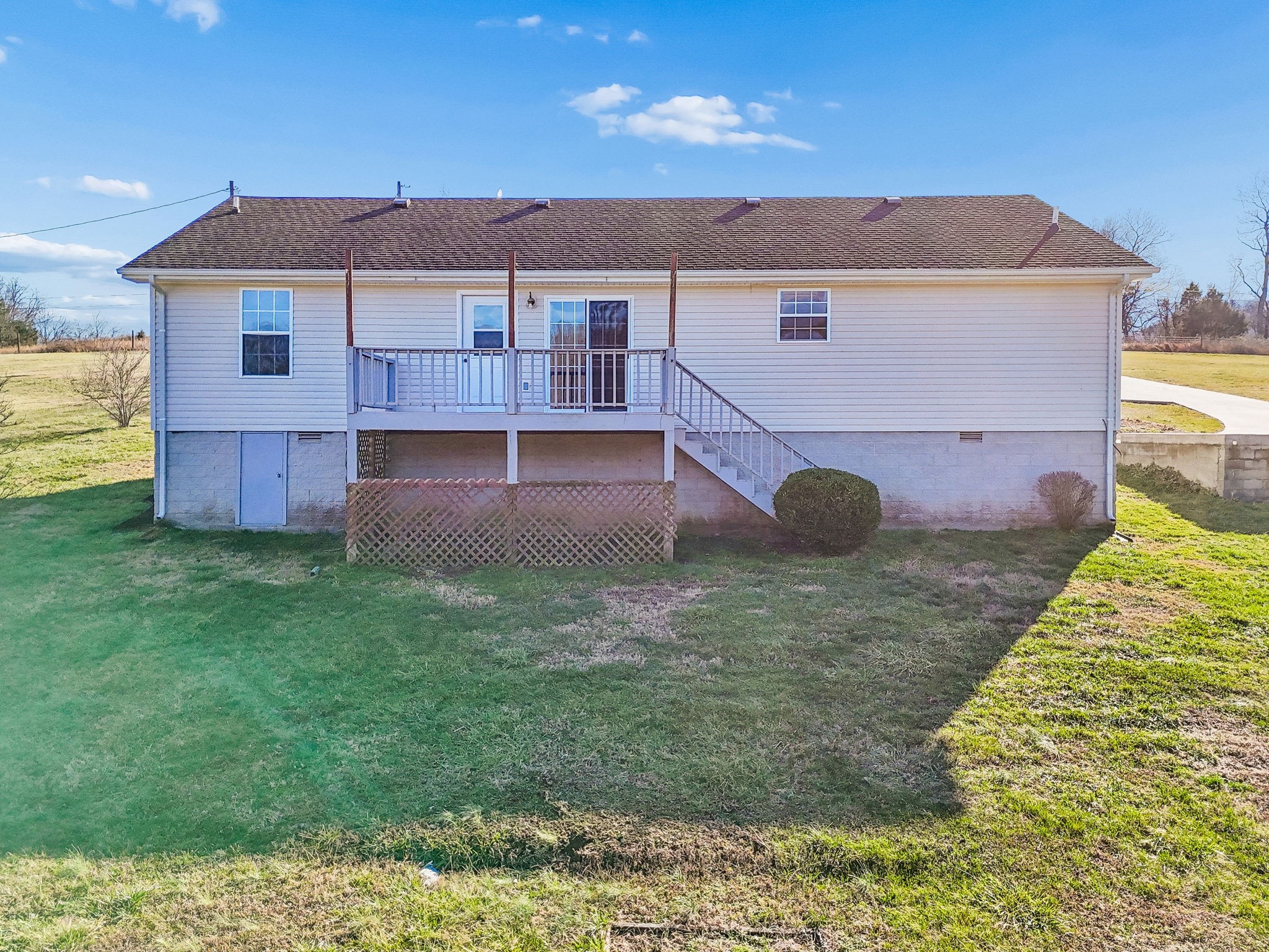 162 Pigeon Roost Road Brush Creek, TN 38547 - Photo 49 of 50 a view of a house with a backyard