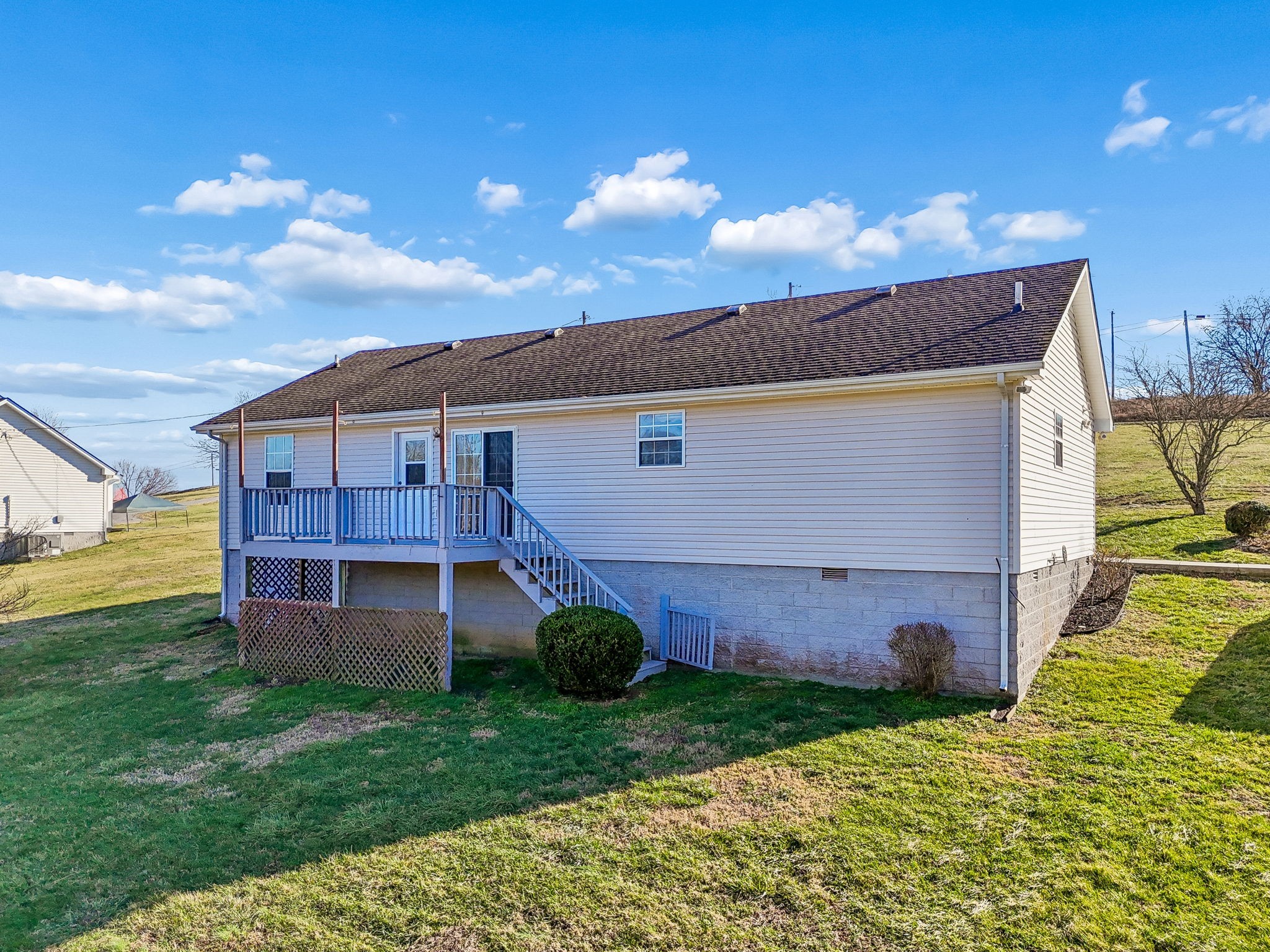 162 Pigeon Roost Road Brush Creek, TN 38547 - Photo 50 of 50 a view of a house with a backyard