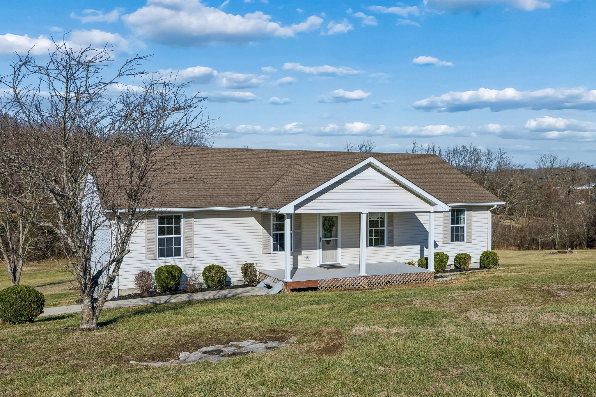 162 Pigeon Roost Road Brush Creek, TN 38547 - Photo 5 of 50 a view of a house with backyard