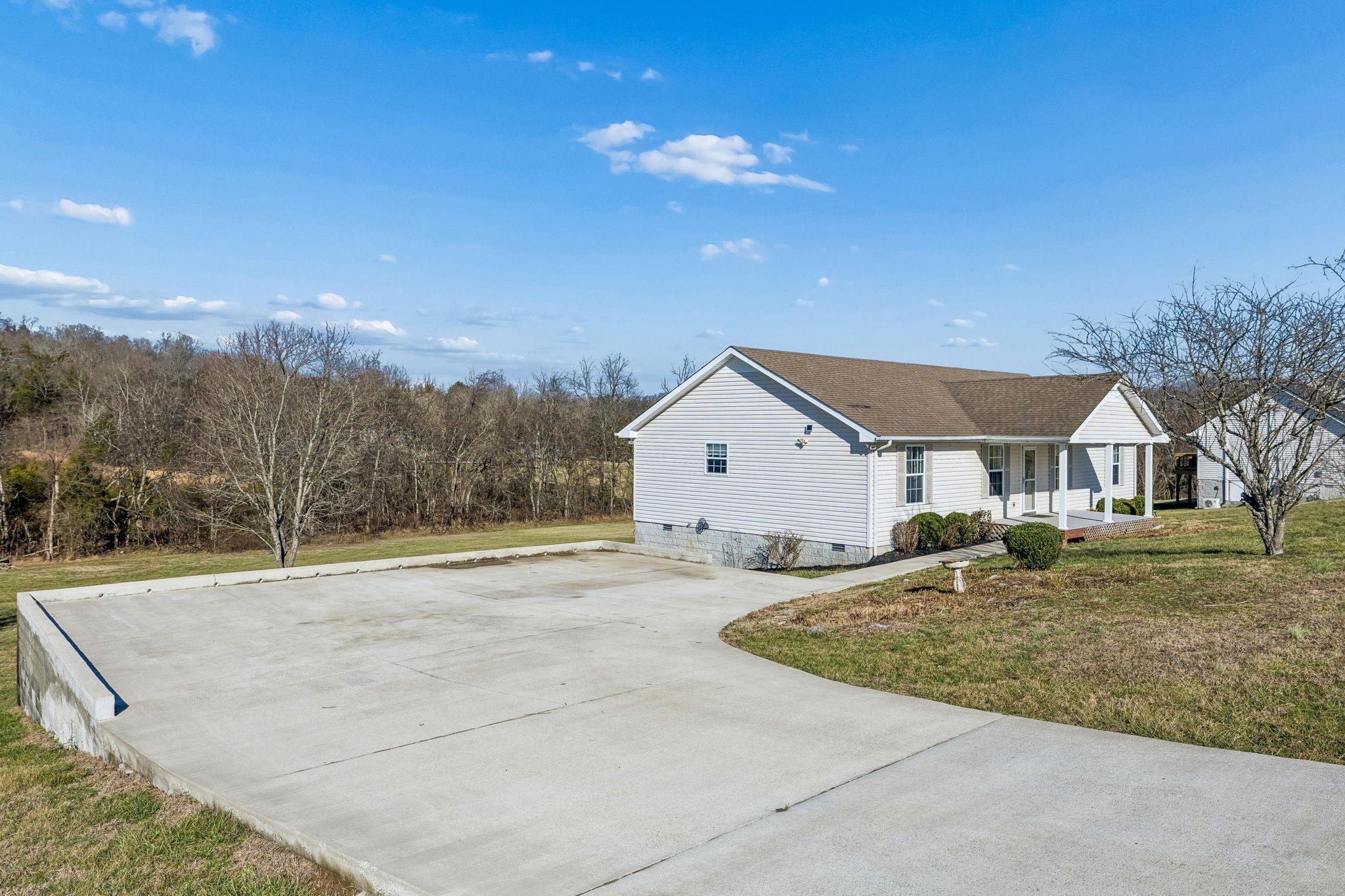 162 Pigeon Roost Road Brush Creek, TN 38547 - Photo 6 of 50 a view of a house with a yard