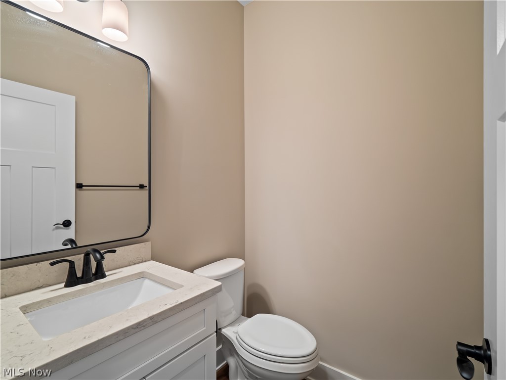 34270 Brookside Lane North Ridgeville, OH 44039 - Photo 24 of 50 Bathroom featuring vanity and toilet