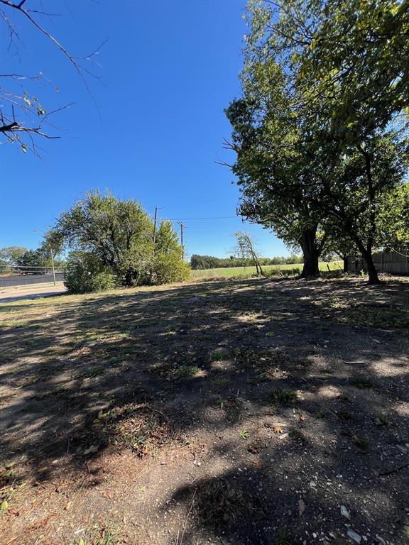9724 Michael Lane Dallas, TX 75228 - Photo 7 of 7 a view of an ocean beach