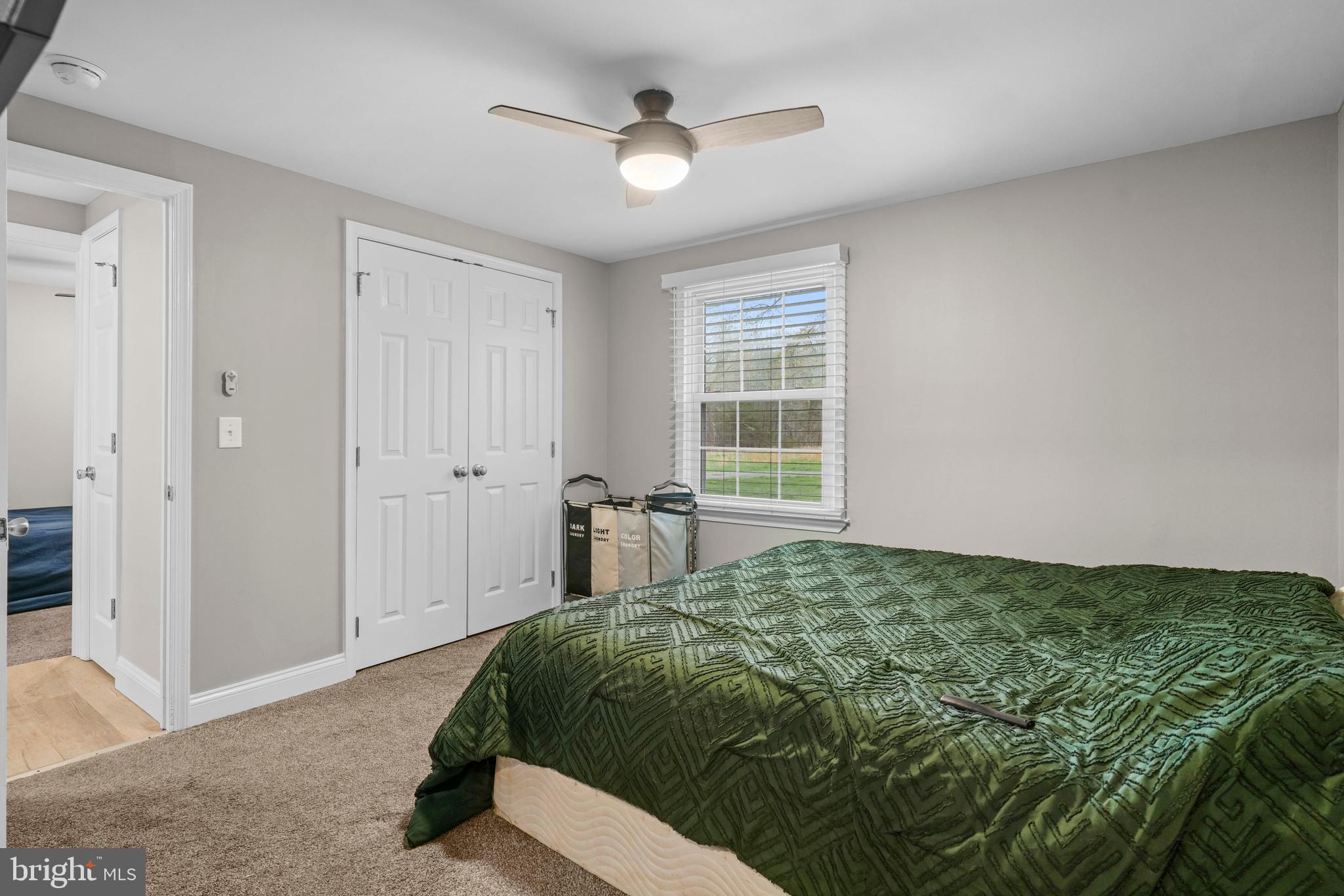 15928 Brandywine Road Brandywine, MD 20613 - Photo 15 of 40 a bedroom with a bed and a window