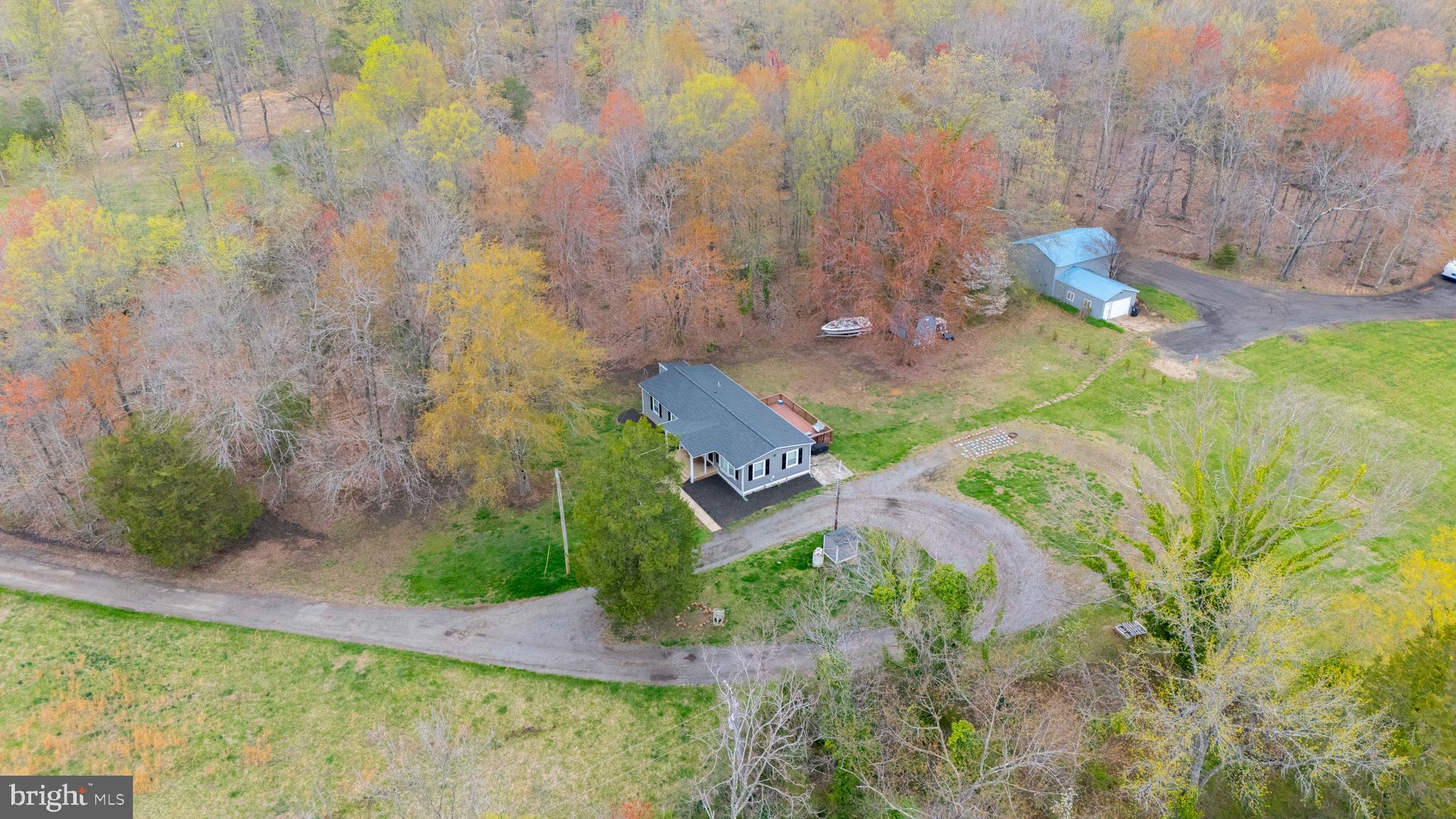 15928 Brandywine Road Brandywine, MD 20613 - Photo 21 of 40 a view of a house with a yard and sitting area