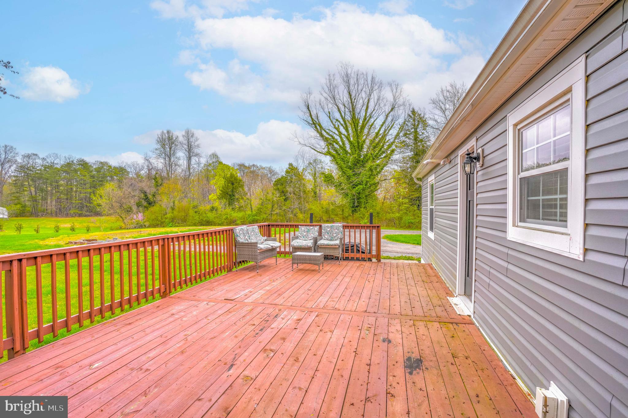 15928 Brandywine Road Brandywine, MD 20613 - Photo 26 of 40 a view of balcony with wooden floor and seating space