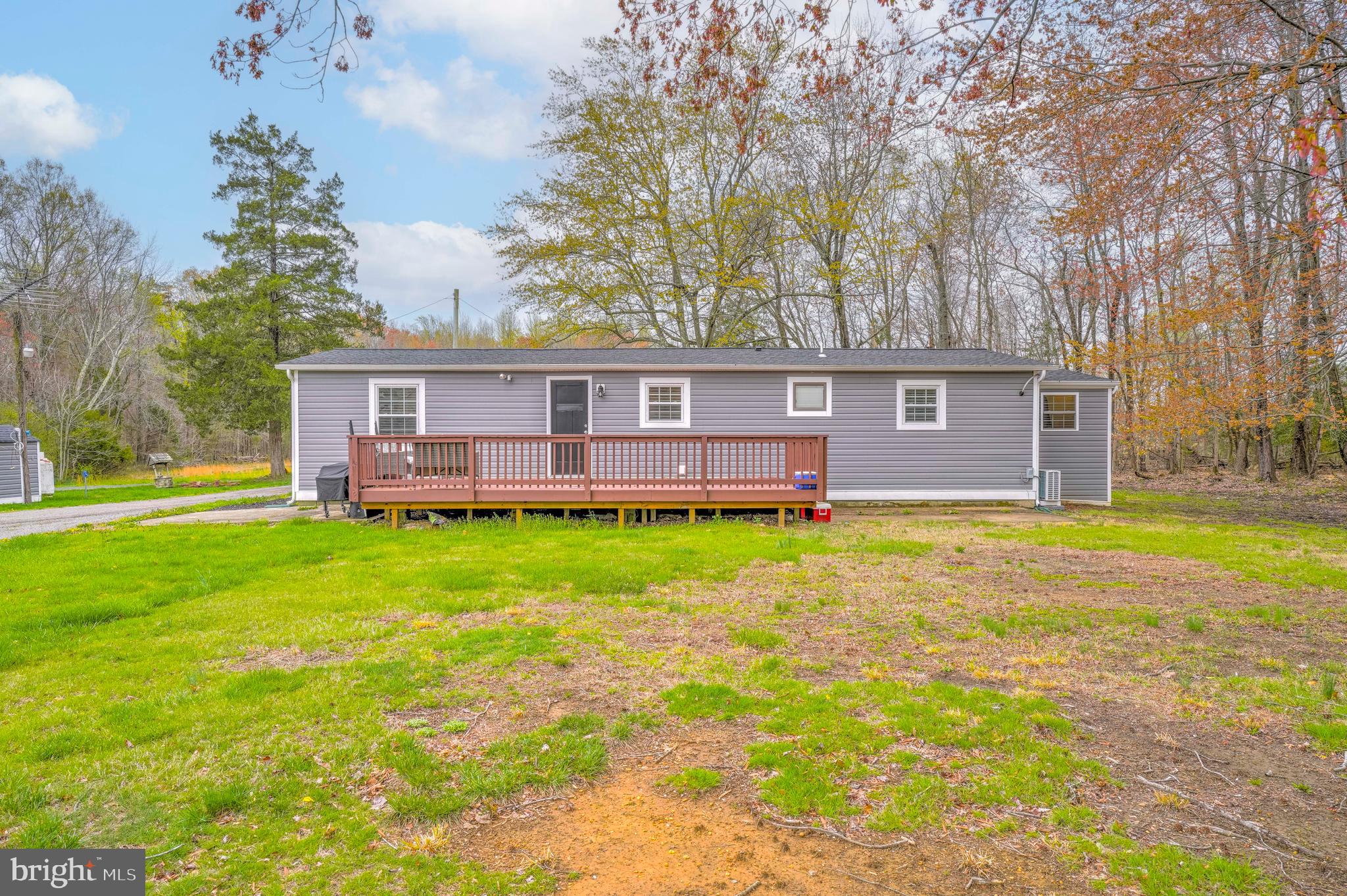 15928 Brandywine Road Brandywine, MD 20613 - Photo 27 of 40 a view of a house with a backyard and a patio