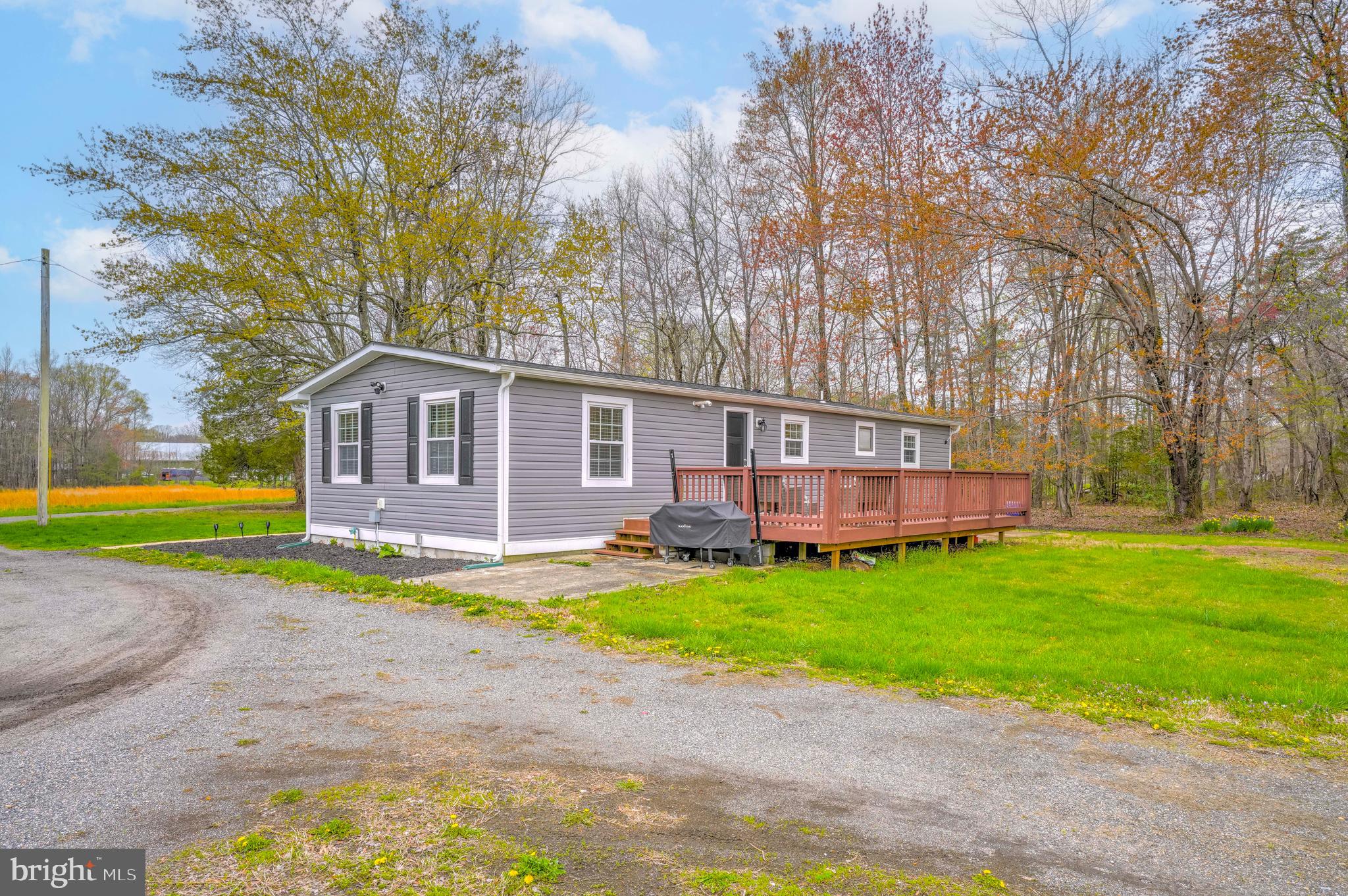 15928 Brandywine Road Brandywine, MD 20613 - Photo 28 of 40 a view of a house with a yard and sitting area