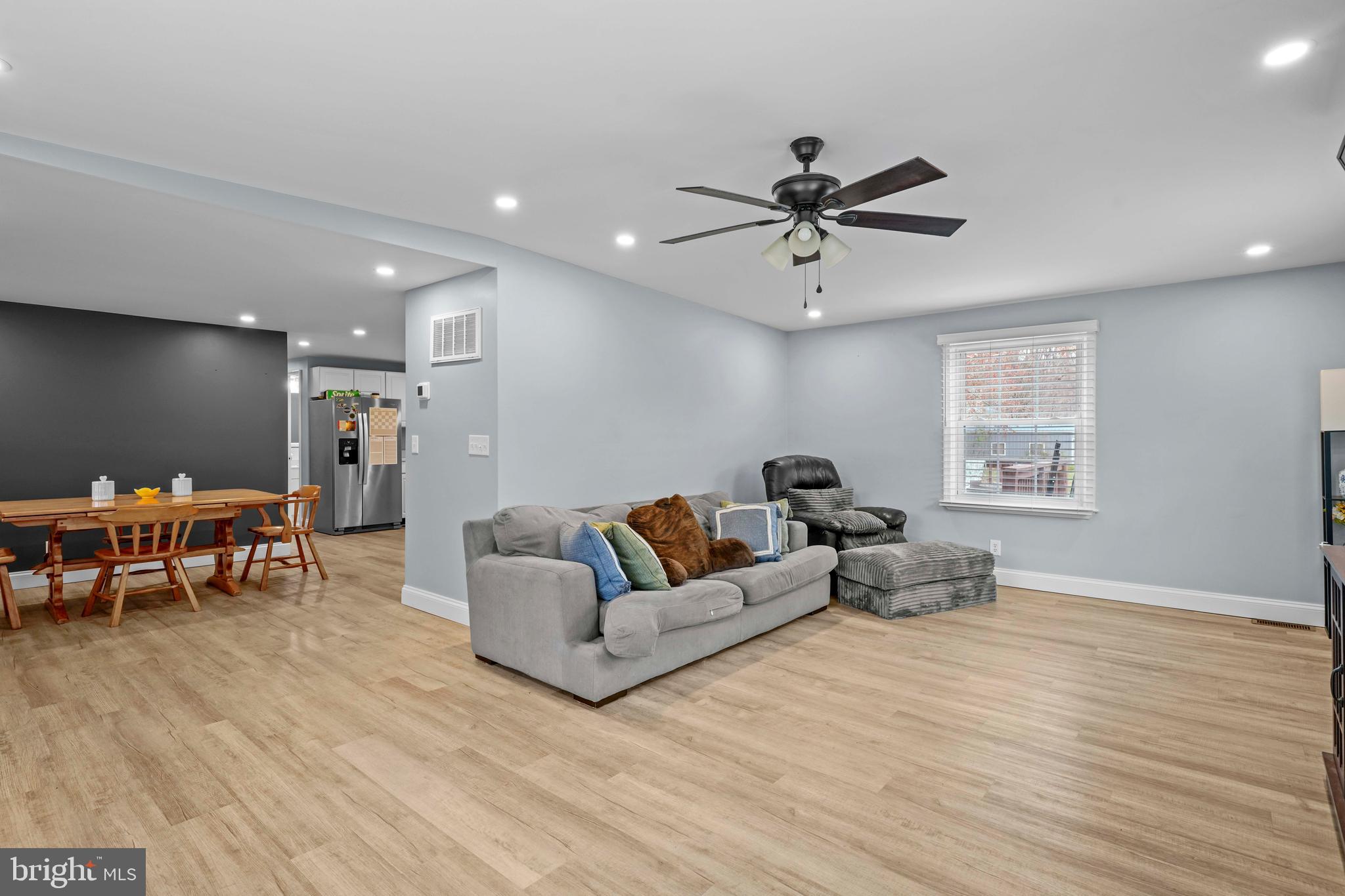15928 Brandywine Road Brandywine, MD 20613 - Photo 3 of 40 a living room with furniture and a chandelier