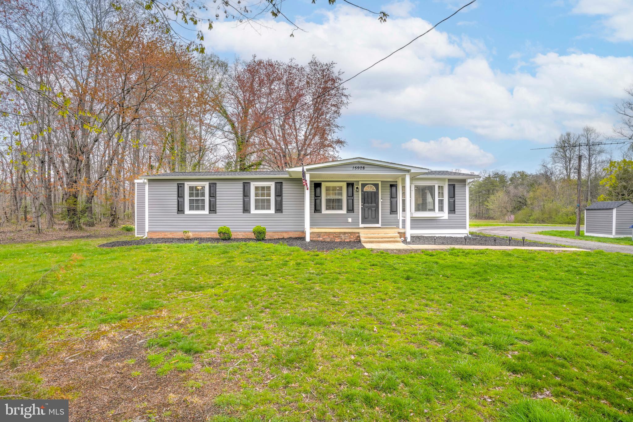 15928 Brandywine Road Brandywine, MD 20613 - Photo 33 of 40 a front view of a house with a garden
