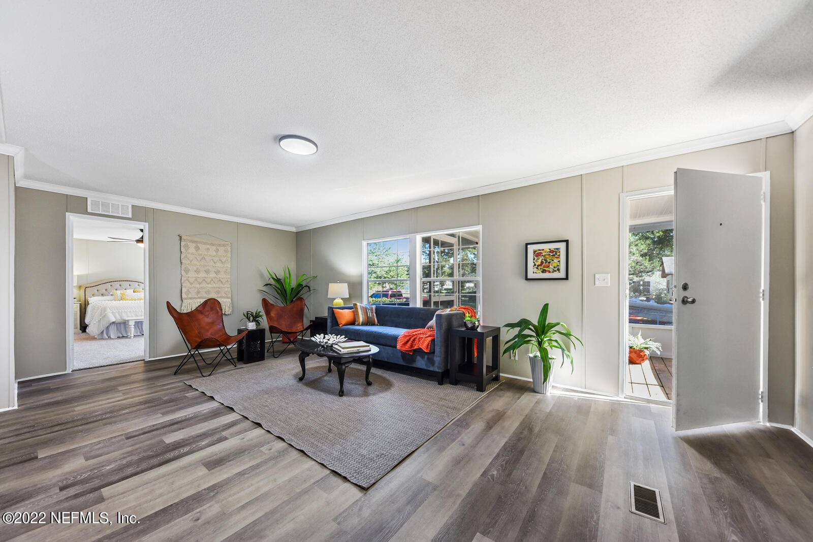 3665 Loango Road Orange Park, FL 32065 - Photo 9 of 28 a living room with furniture and wooden floor