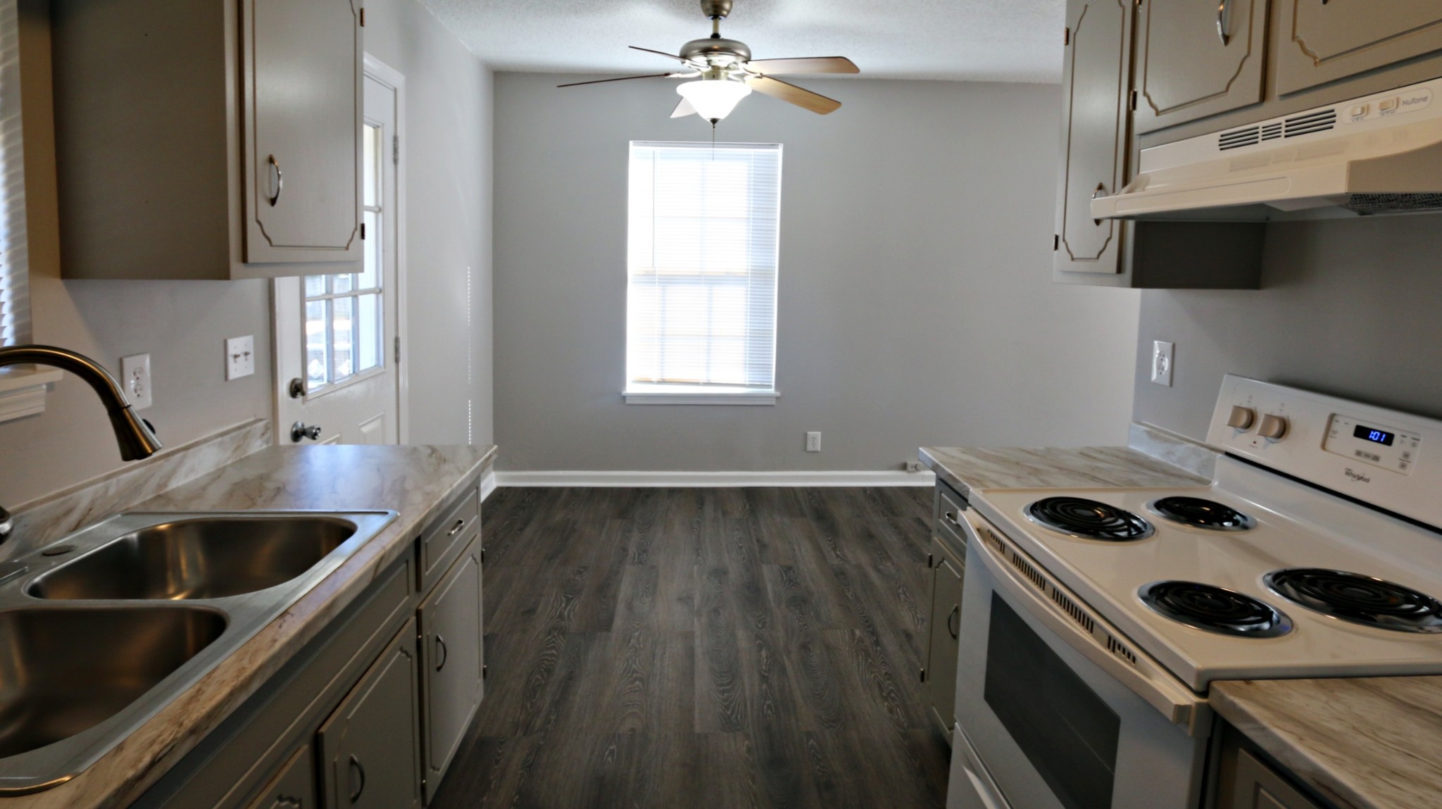 260 Hugh Hunter Road Oak Grove, KY 42262 - Photo 19 of 30 a kitchen that has a sink and a stove