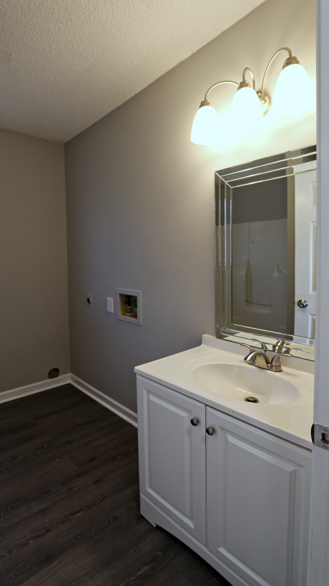 260 Hugh Hunter Road Oak Grove, KY 42262 - Photo 24 of 30 a bathroom with a sink and a mirror