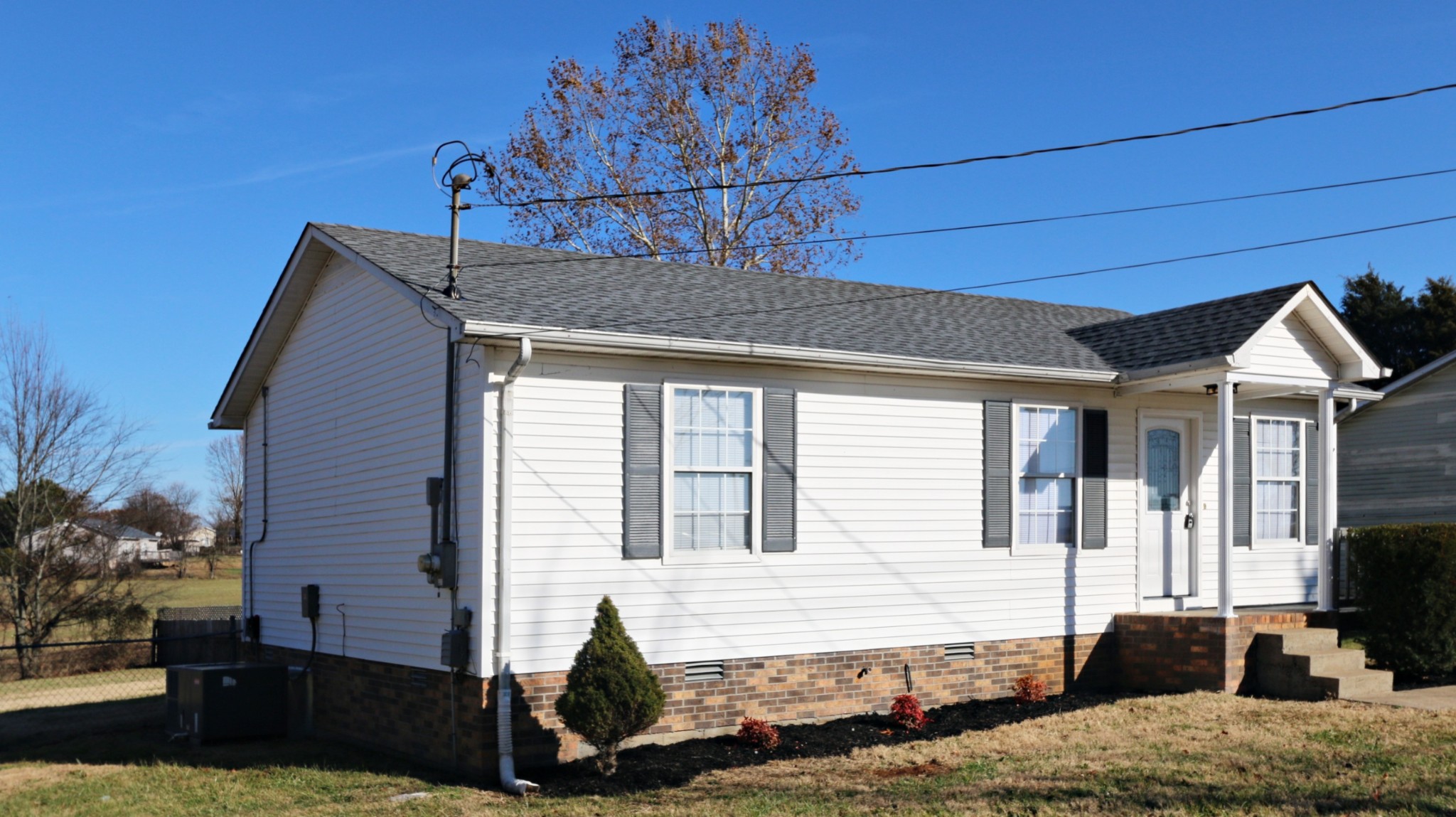 260 Hugh Hunter Road Oak Grove, KY 42262 - Photo 3 of 30 a front view of a house with garden