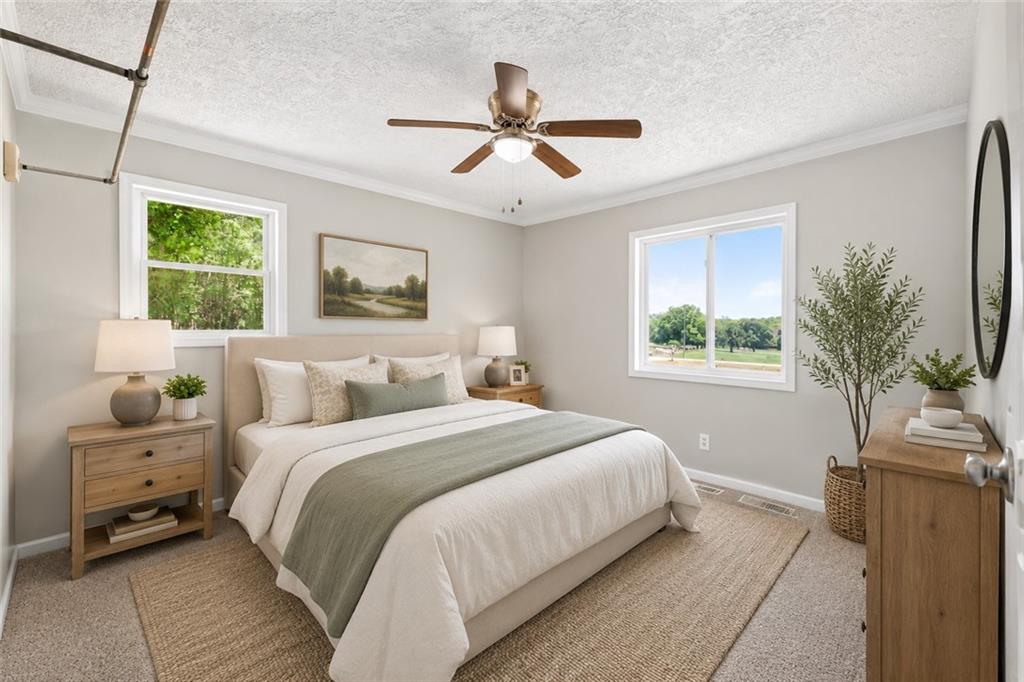 3696 Crabapple Hollow Road Nicholson, GA 30565 - Photo 18 of 38 a bedroom with a bed and a window