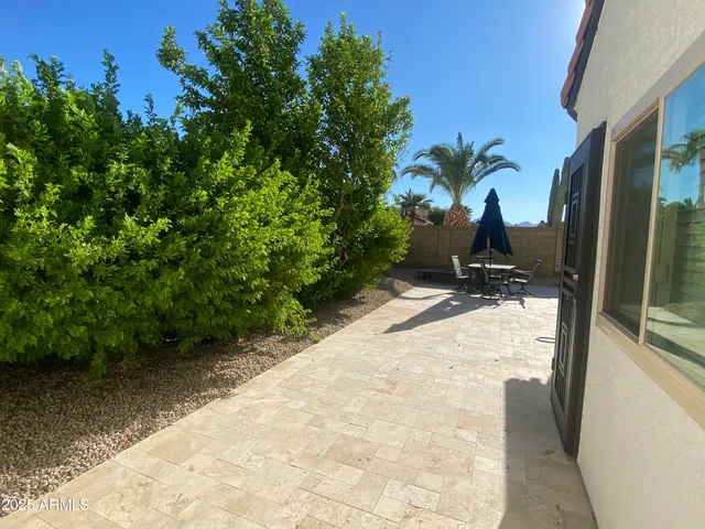 a view of a street with cars