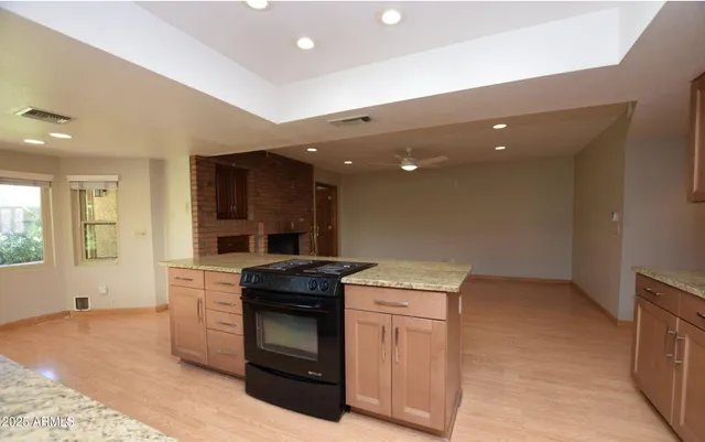 a kitchen with a stove and a sink