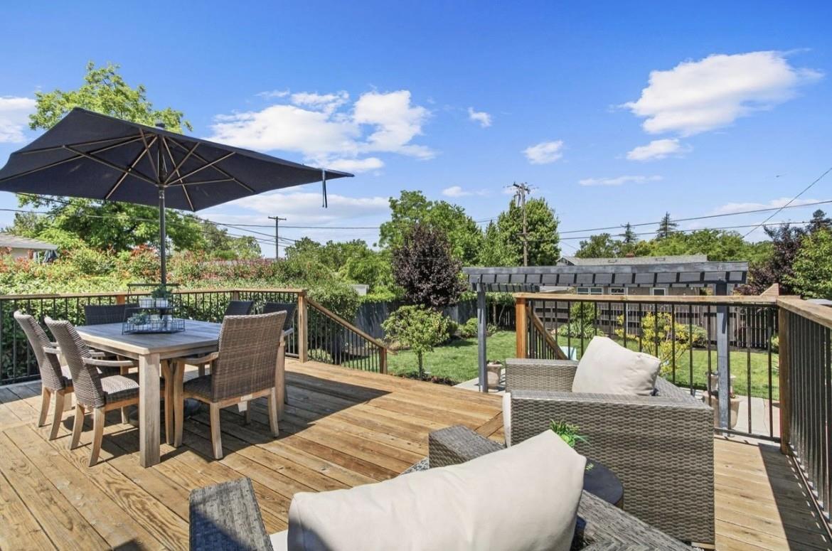 500 Main Street Roseville, CA 95678 - Photo 2 of 23 a view of a patio with couches chairs under an umbrella