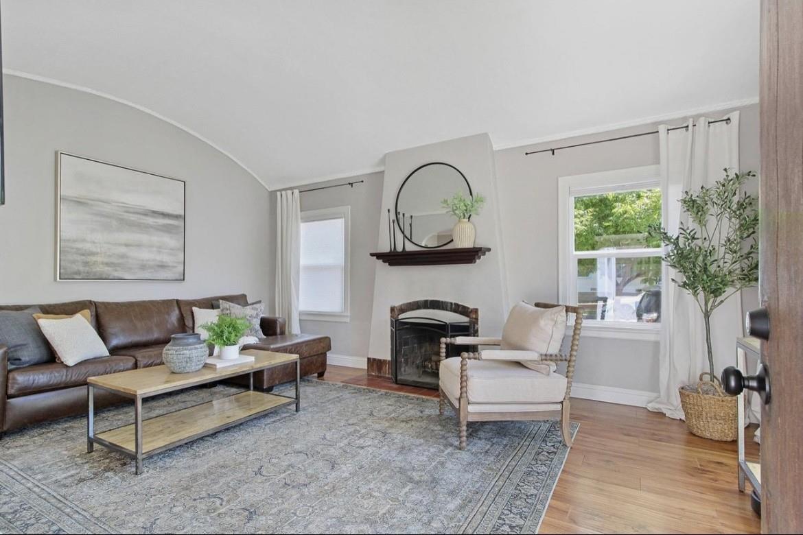 500 Main Street Roseville, CA 95678 - Photo 6 of 23 a living room with furniture a rug a lamp and a large window