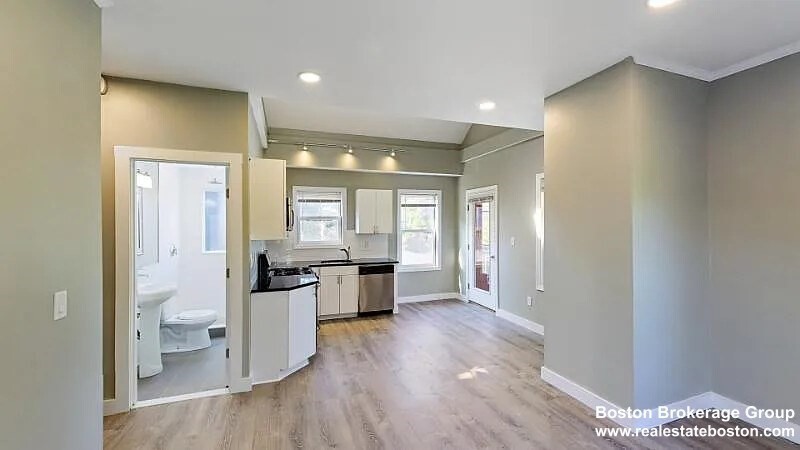 17 Ashley Street, Unit 3 Boston, MA 02130 - Photo 2 of 9 a bathroom with a sink and a mirror